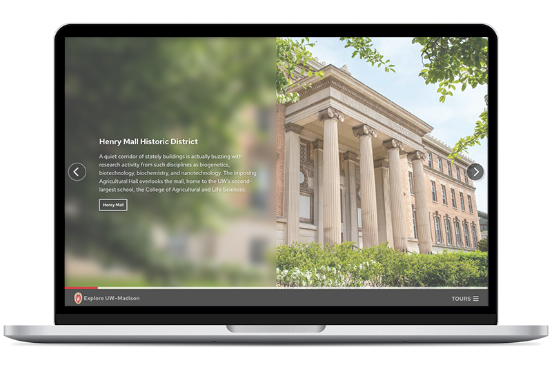 Laptop screen showing an overlay titled Henry Mall Historic District, with a photo of a columned building and text description.